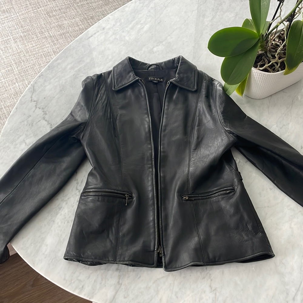 Soft genuine black leather jacket. Runs a little small. It’s gorgeous very chic